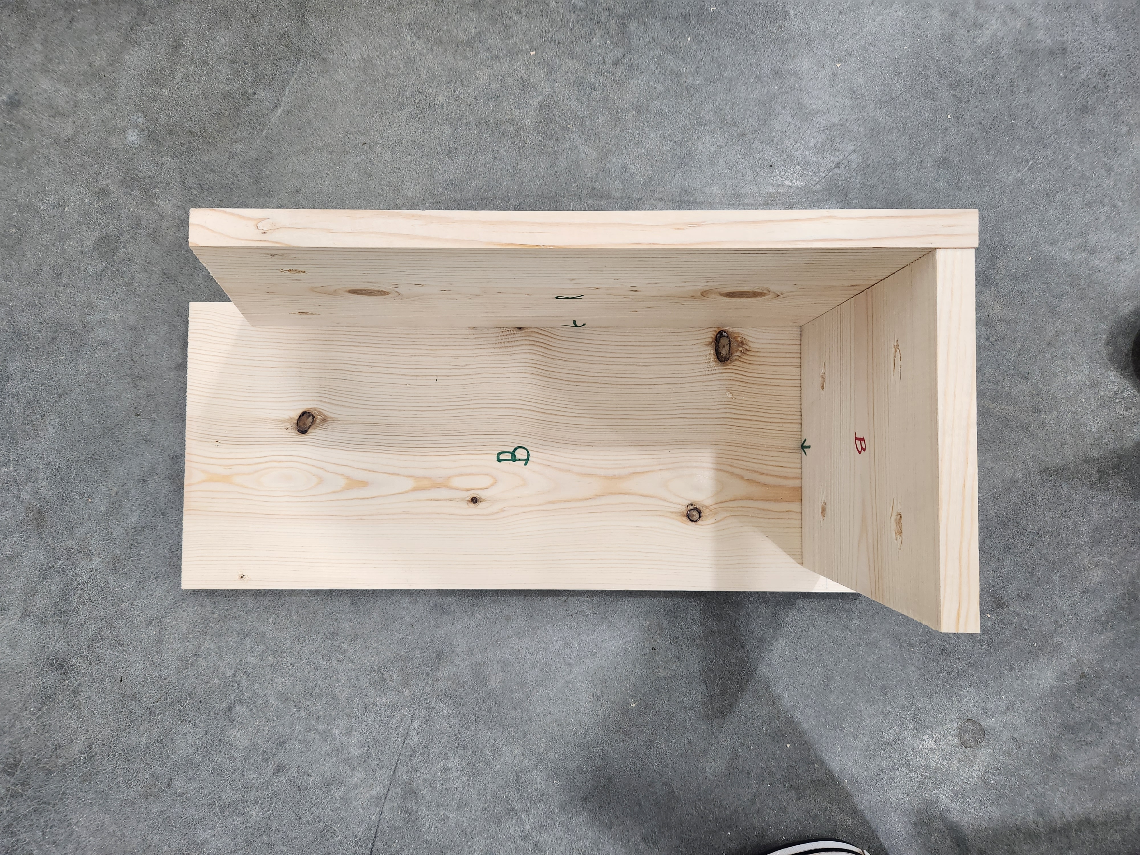 Bottom (Red B) aligning with Back (Green B) and Fixed Side (R) with arrows pointing to the Back (Green B)