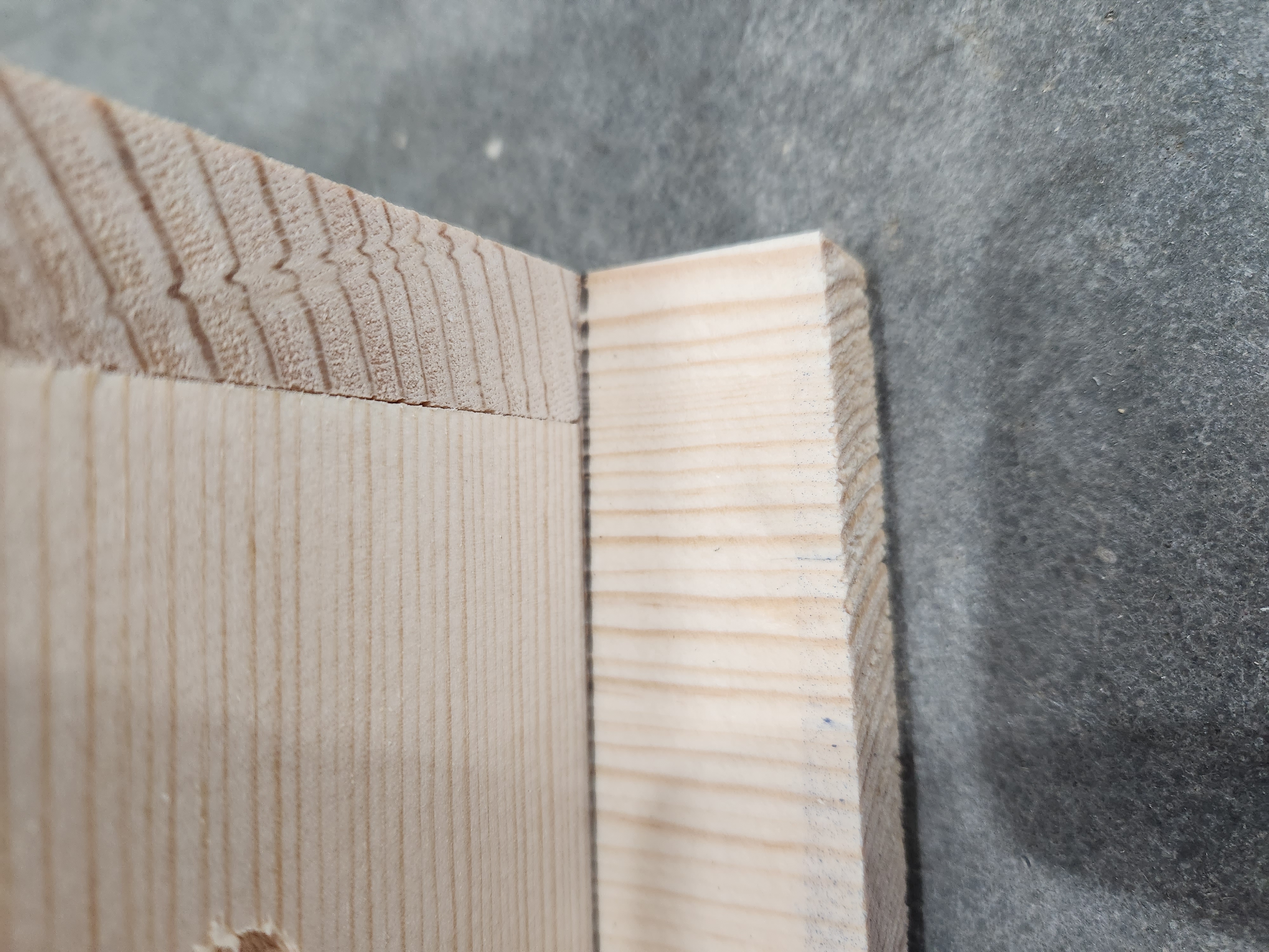 Bottom right corner of Bottom (Red B) aligning with Back (Green B) and Fixed Side (R) aligning with the pencil mark